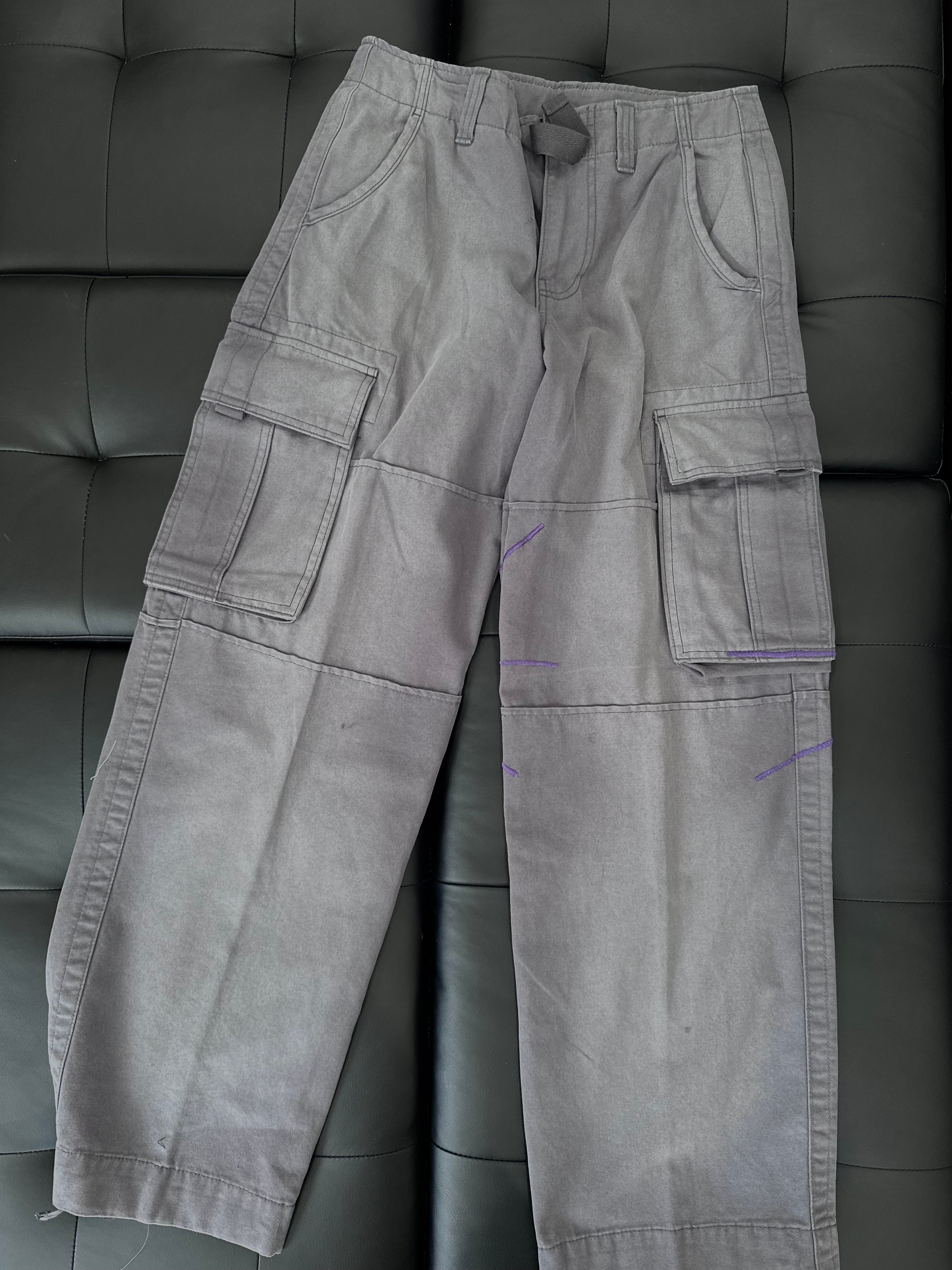Grey panel cargos with an embroidered purple web