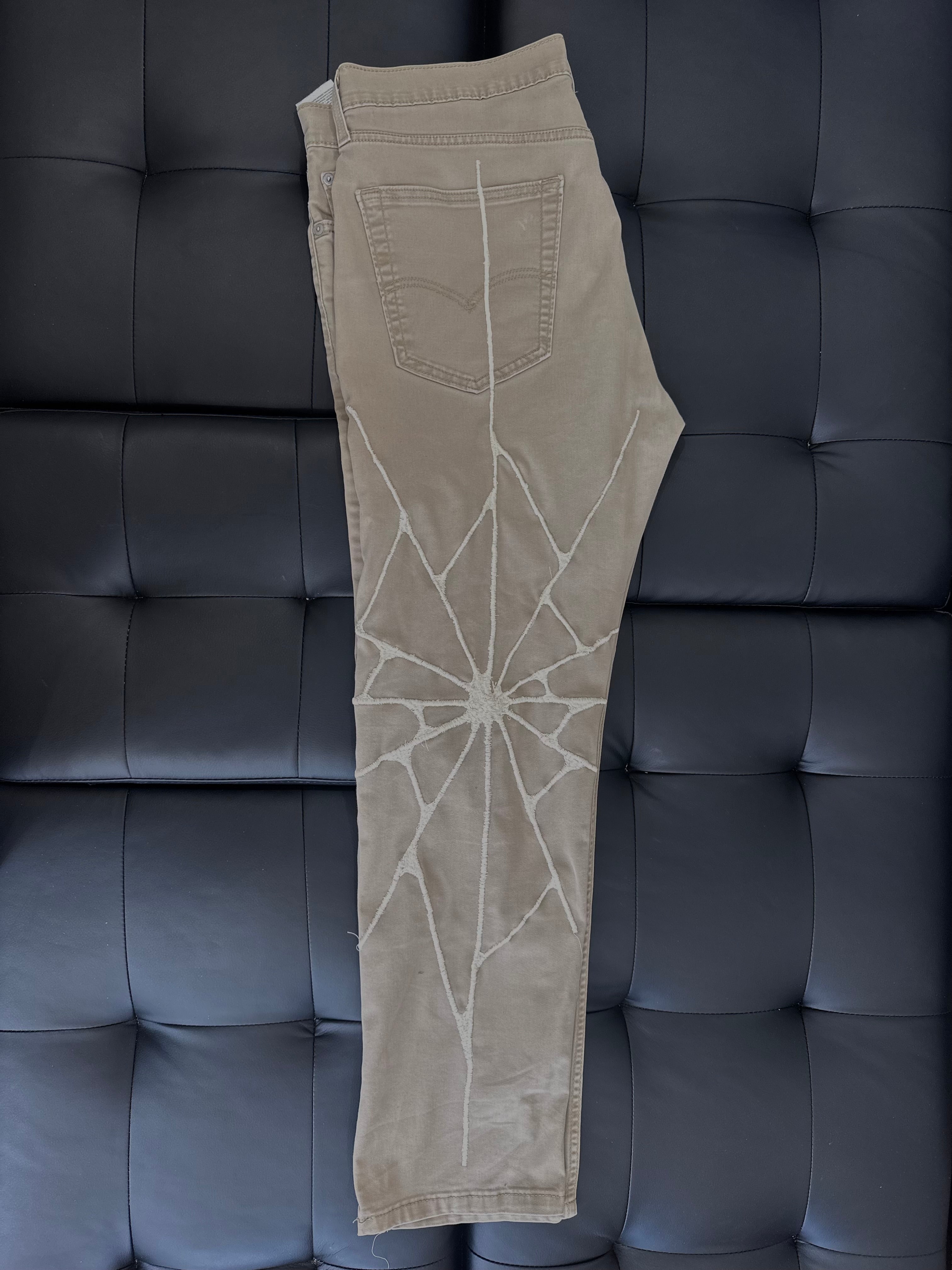 Khaki Levi jeans with w khaki web embroidered