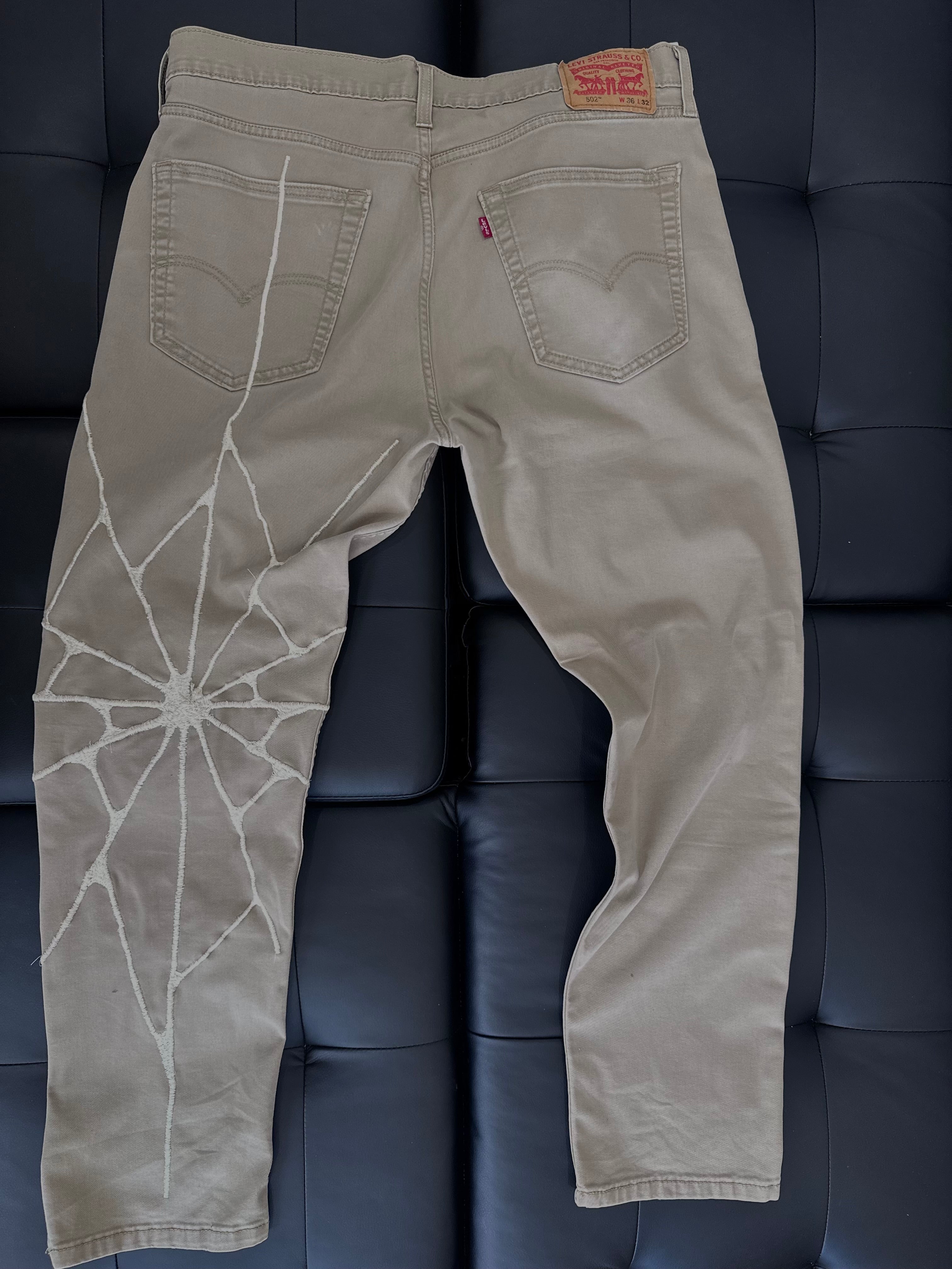 Khaki Levi jeans with w khaki web embroidered
