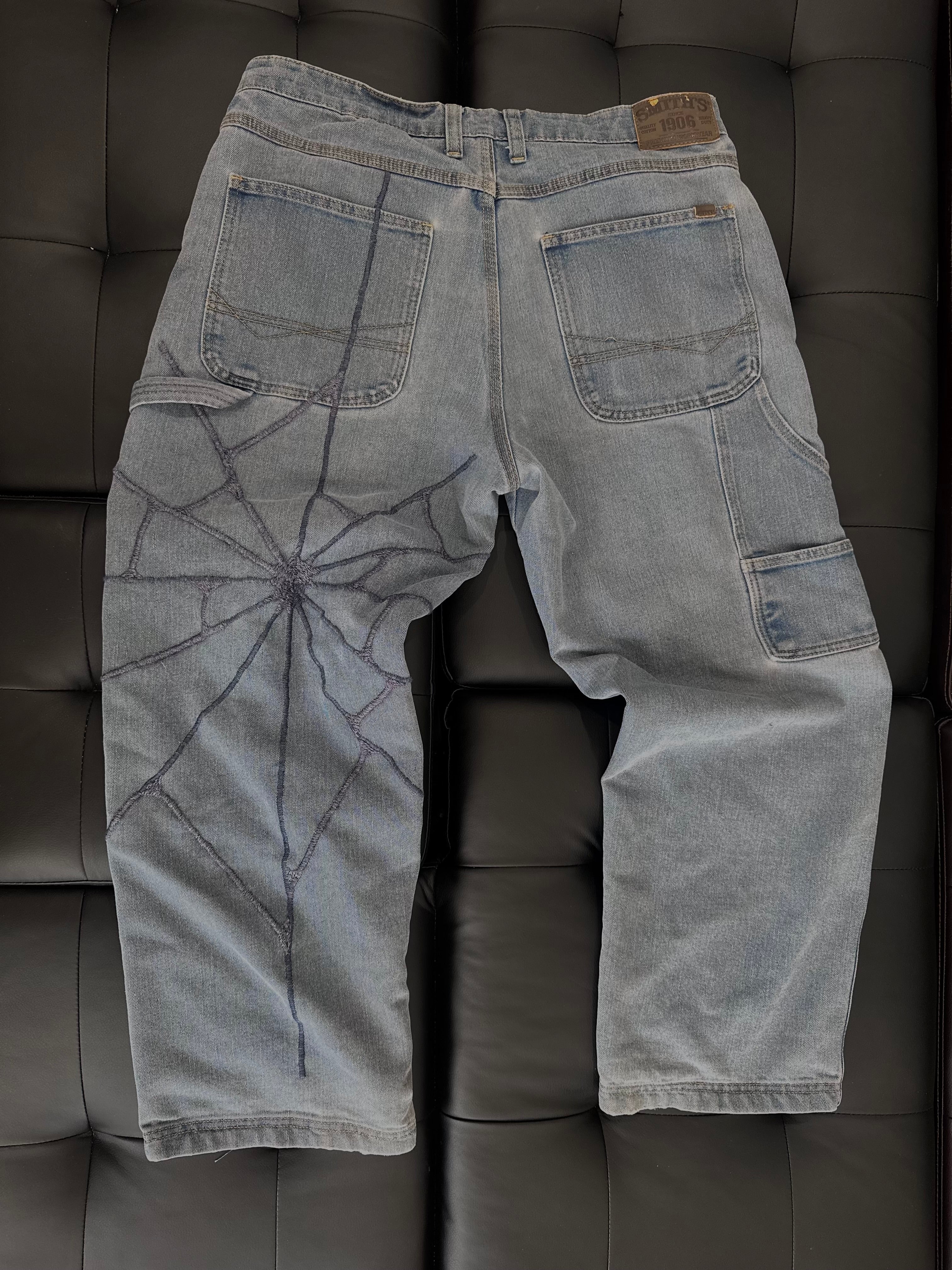 Cargo carpenter jeans with embroidered denim web